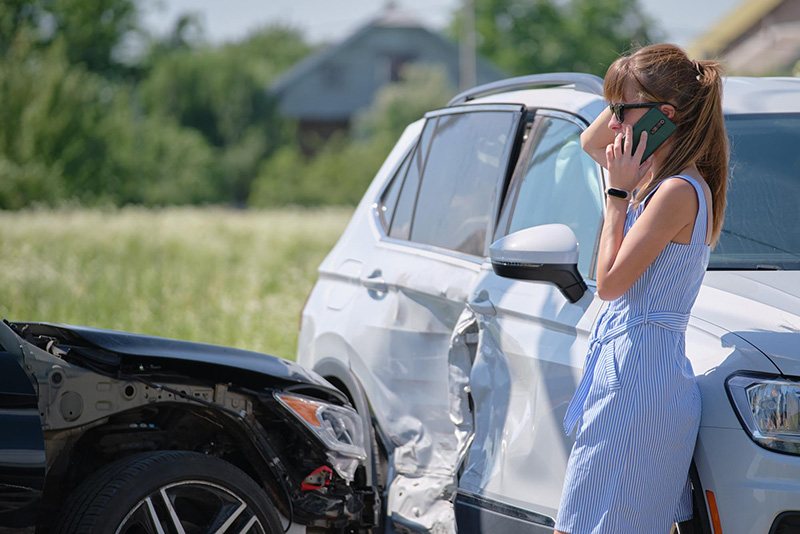 A calm driver assessing the scene after a road traffic accident